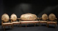 Important set of carved and gilded wood salon furniture, fine Aubusson tapestry including a sofa and a suite of four bergère armchairs, 19th century.