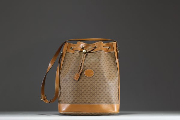 GUCCI - Leather and fabric besace bag, monogrammed, circa 1980, brand and serial number.