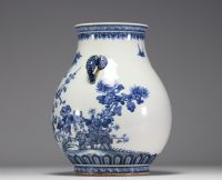 China - White-blue porcelain vase with floral decoration, blue mark under the piece, République period.