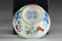 China - Set of three porcelain bowls decorated with roosters, hens and chicks in Ducaï enamels.