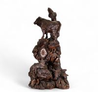 Switzerland, 19th century - Black Forest clock in carved wood
