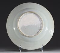 China - Pink family polychrome porcelain plate decorated with figures and deer, Yongzheng period.