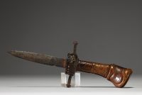 Central European dagger, carved wooden handle, glasswork and steel blade, late 17th century.