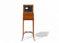 Philippe WOLFERS (1858-1929) Small marquetry cabinet containing a toiletry set.