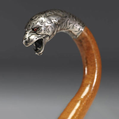 Art Deco silver cane with panther head motif, glass eyes, hallmark 800, Switzerland.