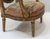 Important set of carved and gilded wood salon furniture, fine Aubusson tapestry including a sofa and a suite of four bergère armchairs, 19th century.