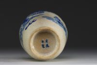China - A 19th century Nanking porcelain vase decorated with Fô dogs on a crackled background.
