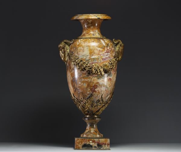 Imposing marble and ormolu urn with ram heads and garlands of flowers, 19th century.