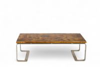 Table basse, vers 1970 Travail attribué à Ado Chale Structure en métal chromé à piètement en double console, plateau rectangulaire en résine à décor incrusté de motif abstrait évoquant une composition