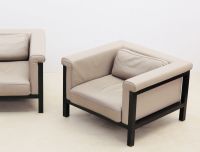 JULES WABBES (1919-1974) Pair of ‘Livourne’ armchairs Series 800 Bulo edition in black lacquered wood and taupe grey leather.