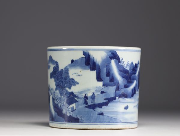 China - A white and blue porcelain brush with landscape decoration.